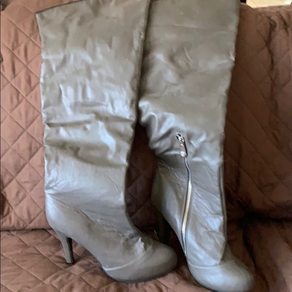 Above the knee fashion boots.